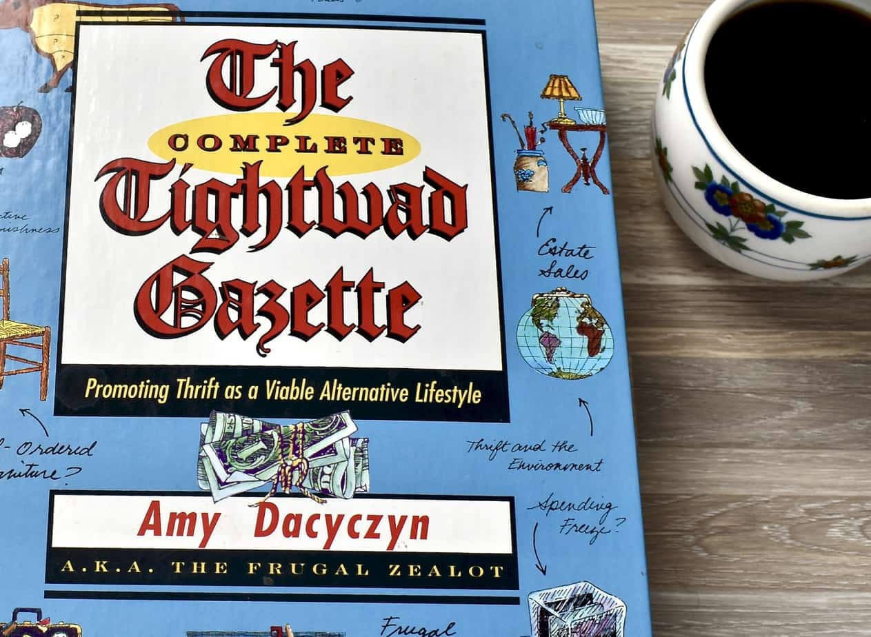 The Tightwad Gazette book with coffee