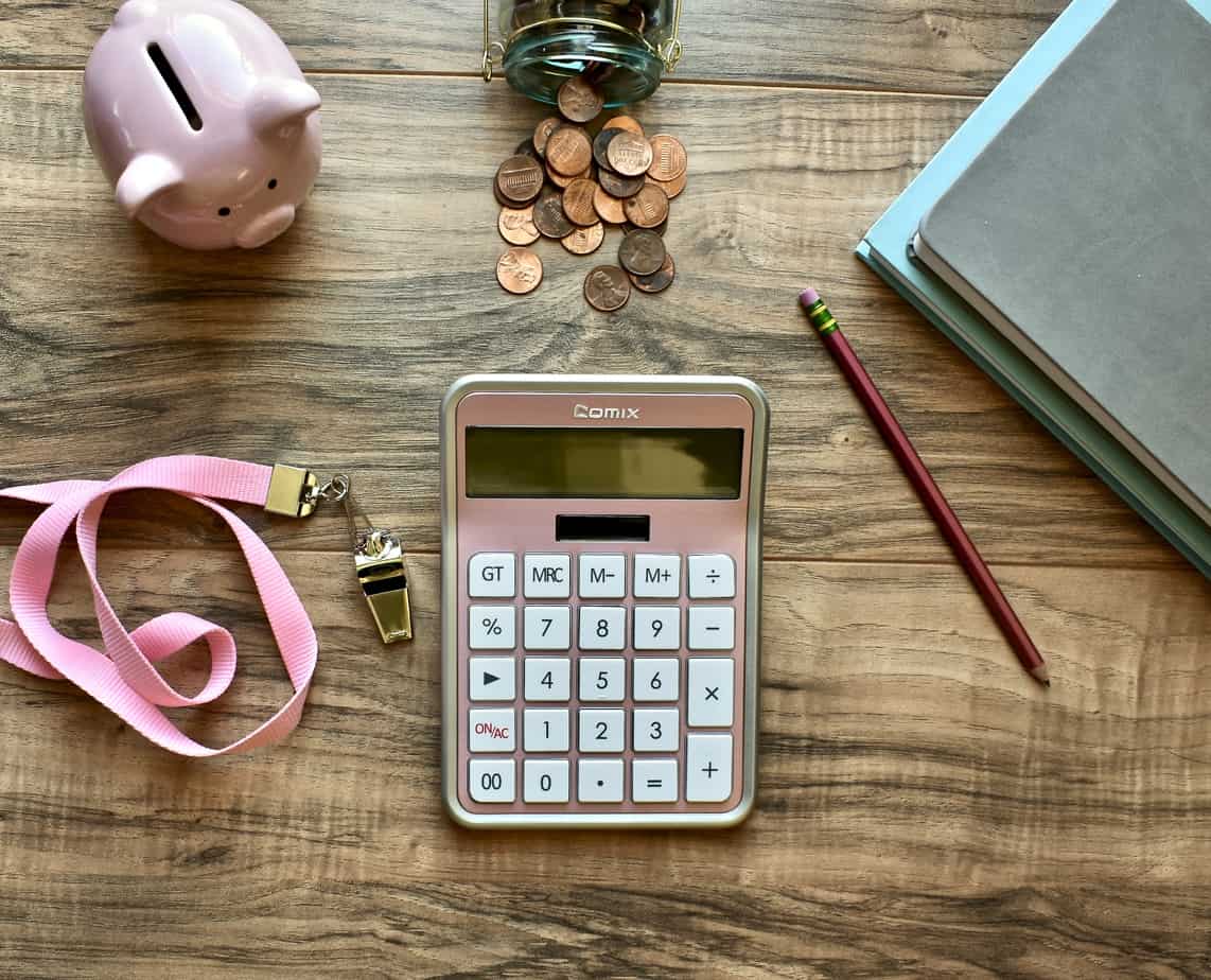 calculator, money, piggy bank, pencil. whistle