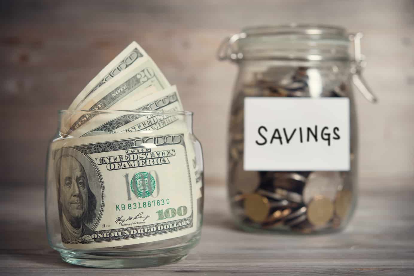 money and savings in a jar