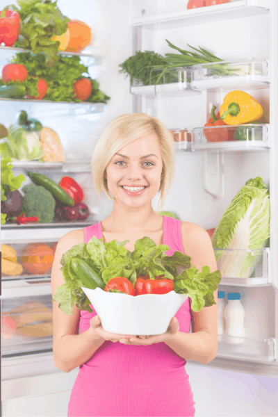 woman happy holding salad