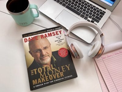 Dave Ramsey Total Money Makeover, Coffee, Computor, and headphones