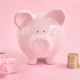 piggy bank, flowers and coins