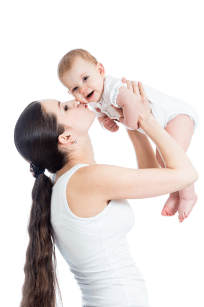 mom with dark hair kissing a baby