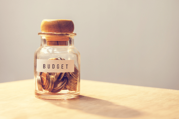 budget label on a jar of coins