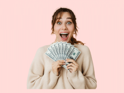 girl holding money from extra paycheck