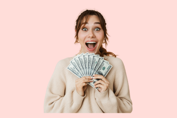 girl holding money from extra paycheck