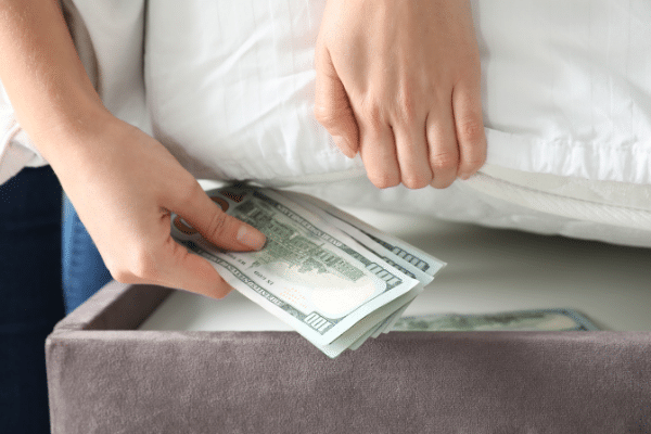 paper money under bed mattress