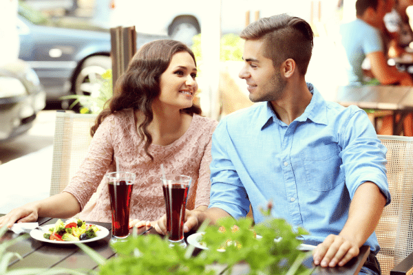 man woman at a restaurant