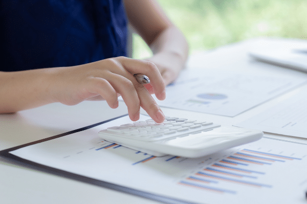 woman using calculator