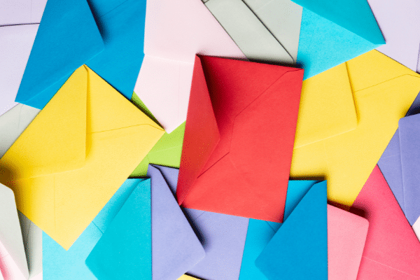 pile of colored envelopes