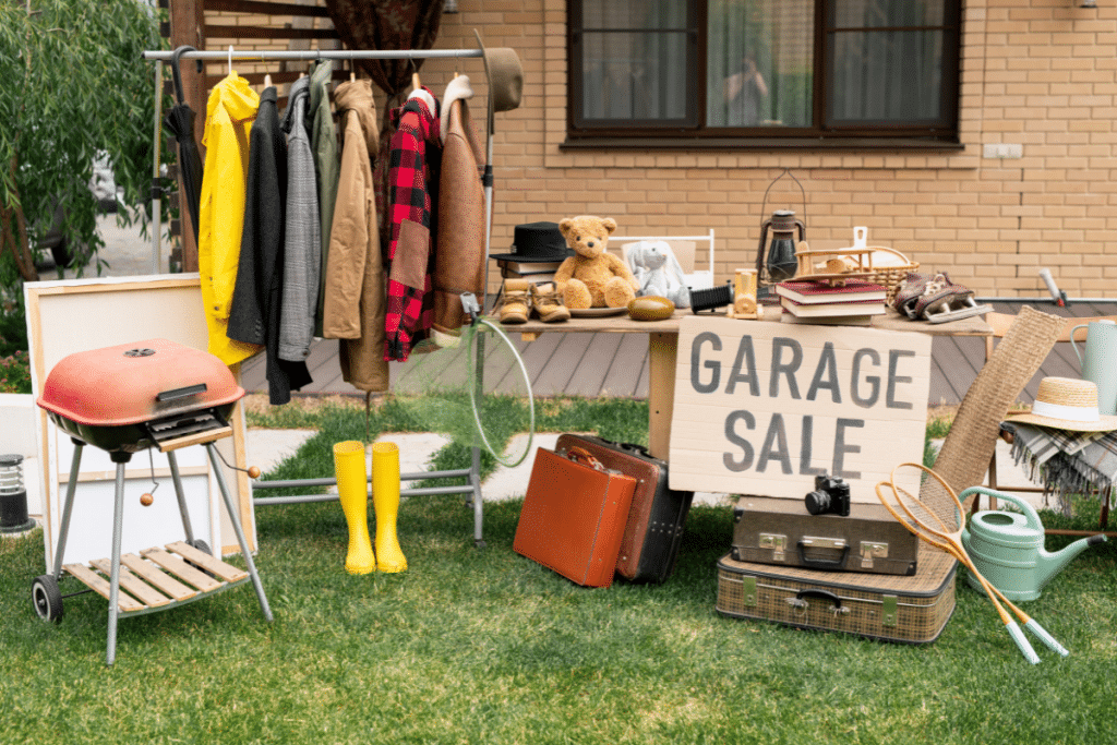 garage sale sign stuff in yard