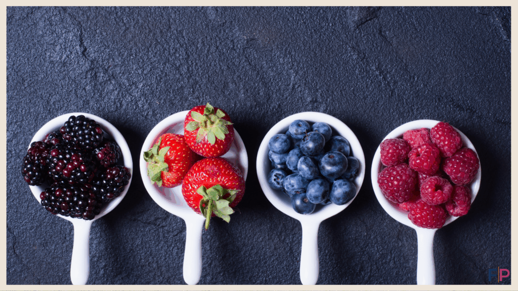 Selection of berries on spoons